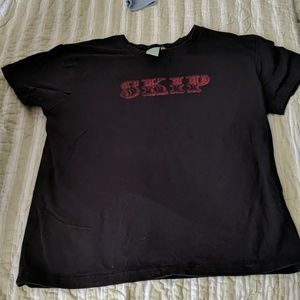 Lucy Black Short Sleeve T-shirt with 'SKIP'